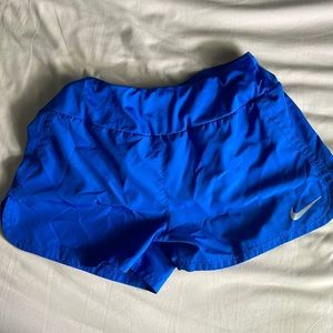 Blue Nike shorts (size small)